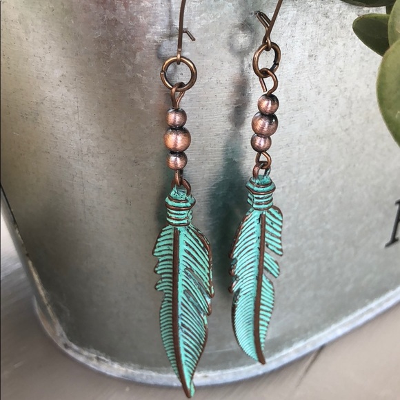 Jewelry - Feather earrings. Bronze with turquoise wash.